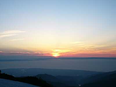 日本海、能登半島の奥に沈む夕陽　　　04.6.16の画像